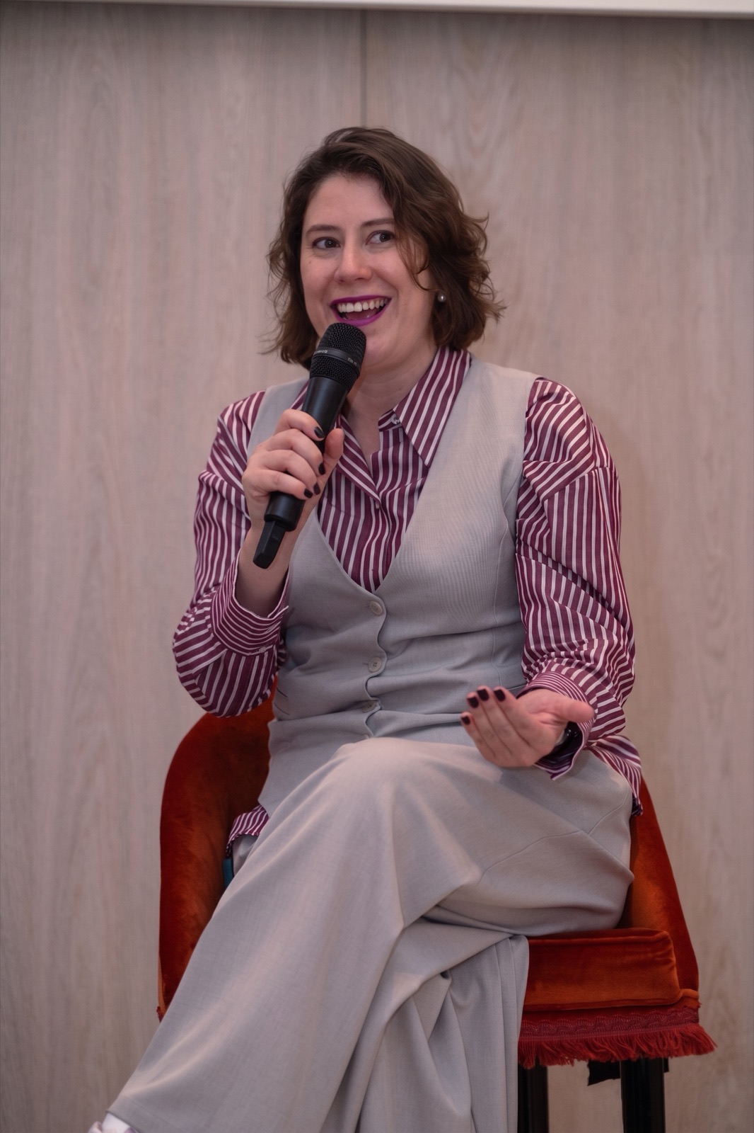 Cristina Peñaloza speaking at an event